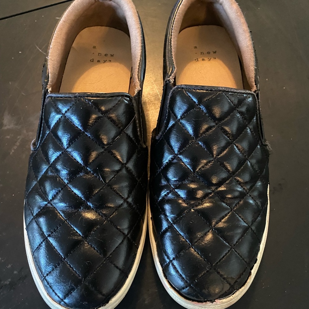 Quilted black a new day tennis shoes